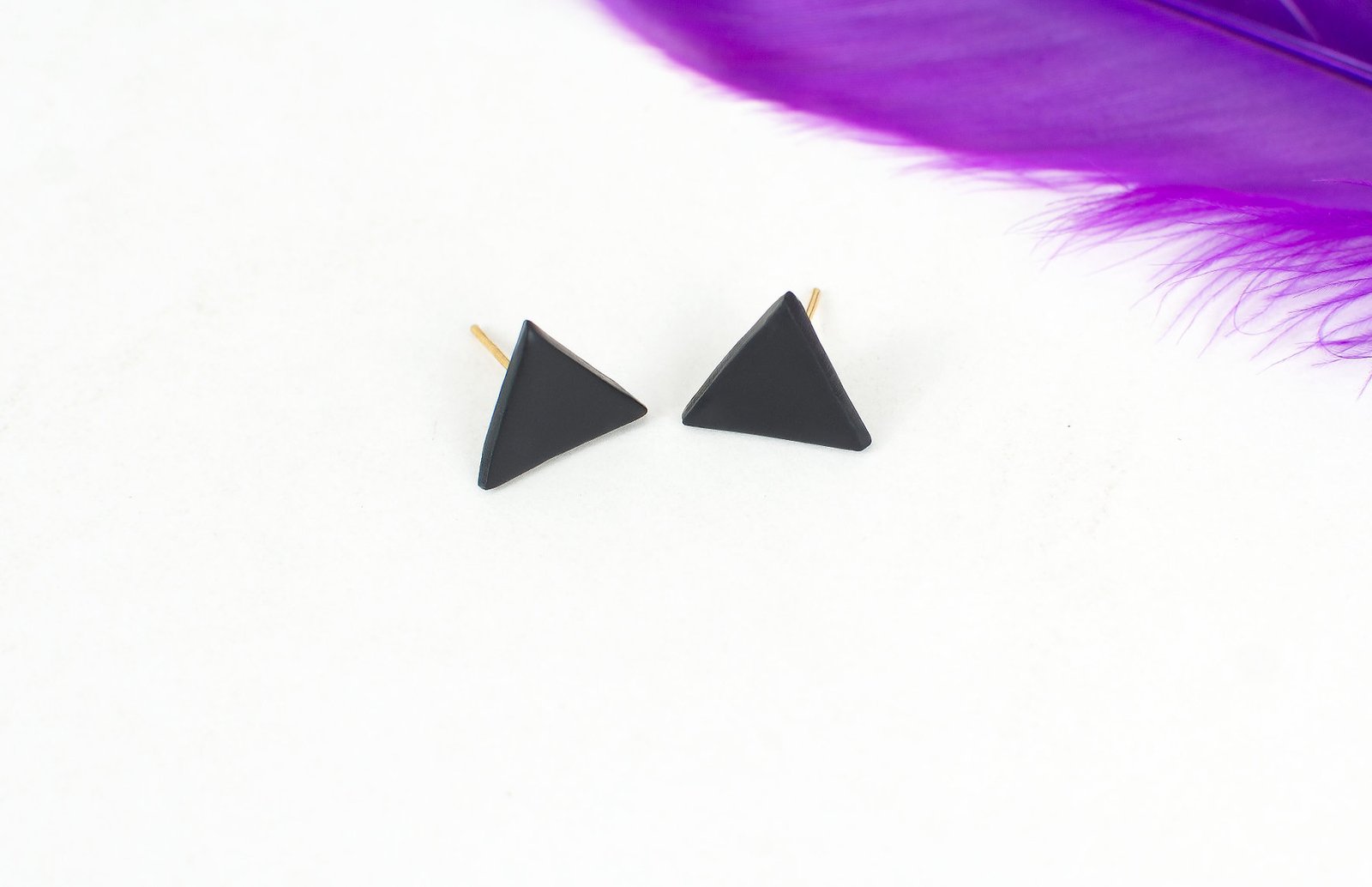 black-triangle-studs